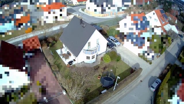 Gepflegtes Einfamilienhaus mit Wärmepumpe in familienfreundlicher Siedlungslage - Luftbild