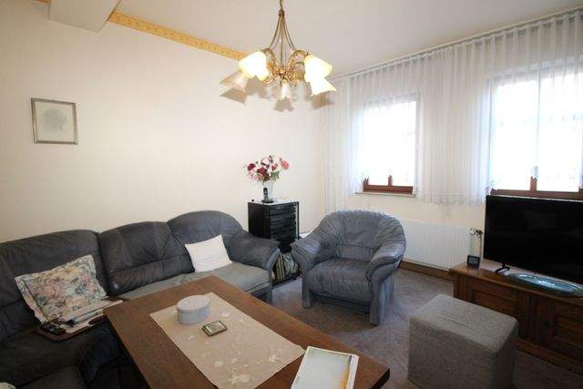 Attraktives Wohn- und Geschäftshaus in Innenstadtlage - Wohnzimmer 1. OG