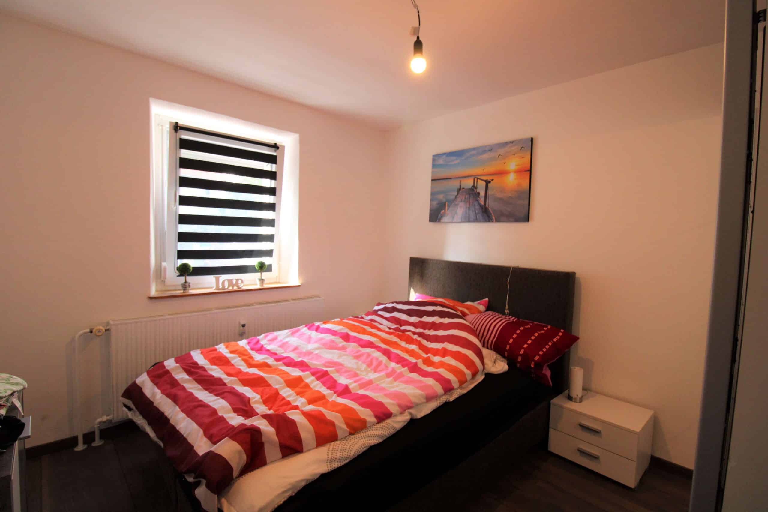 Schön renovierte Erdgeschosswohnung im Ortskern - Schlafzimmer