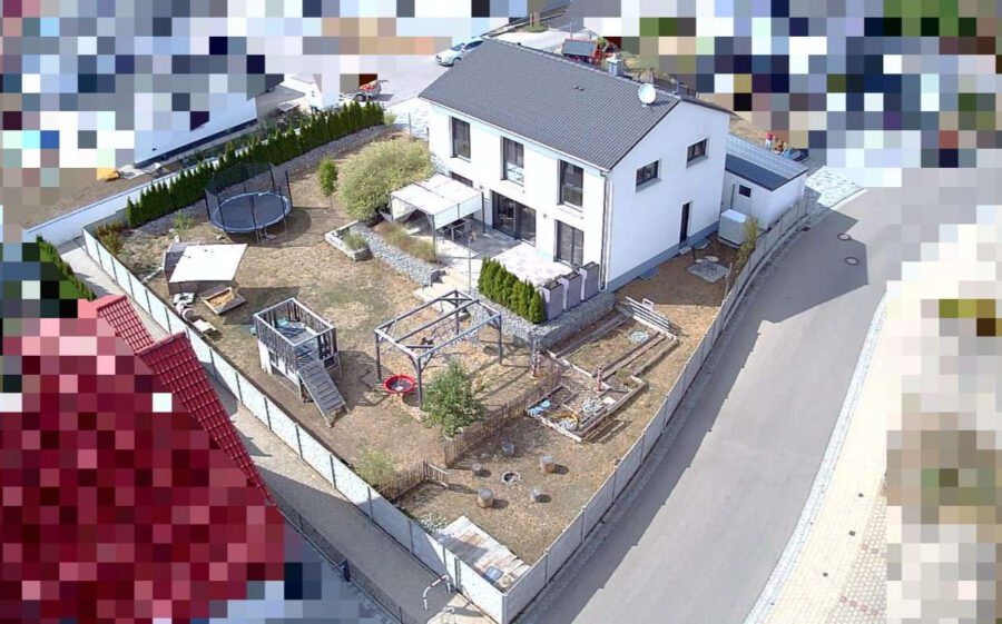 Neuwertiger Wohntraum in familienfreundlicher Siedlung - Luftbild