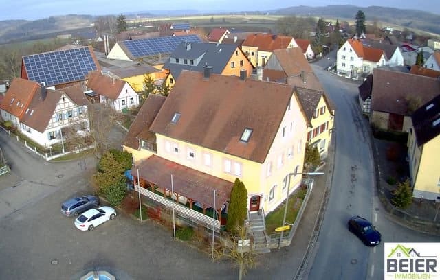 Großzügiges Mehrfamilienhaus mit Gewerbeeinheit in zentraler Lage - Außenansicht